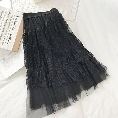 Modern női szoknya fekete, fehér és bézs színben, rugalmas derékkal