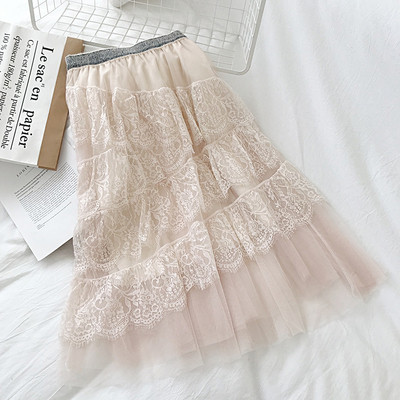 Modern női szoknya fekete, fehér és bézs színben, rugalmas derékkal