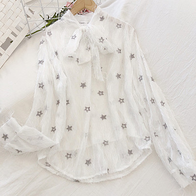 Fehér és fekete színű női ing flitterrel és hosszú ujjal