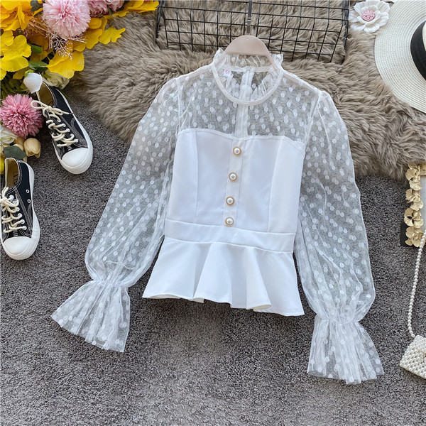 Modern női ing hosszú pecsét ujjakkal és gombokkal fehér és fekete színben