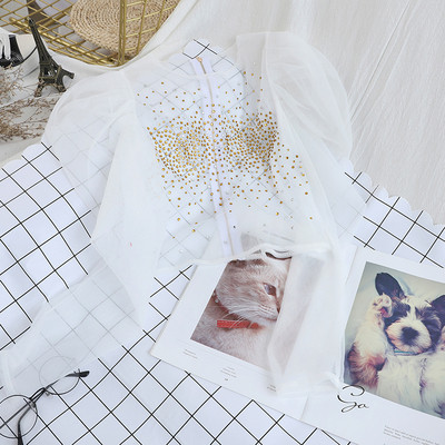 Γυναικεία  μπλούζα με βολάν μανίκια σε μαύρο, κόκκινο, λευκό και πορτοκαλί χρώμα