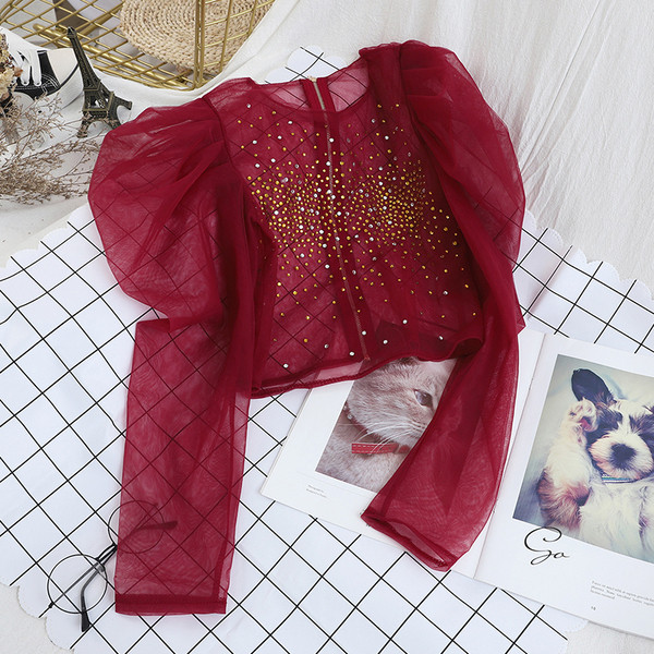 Női formális blúz fekete, piros, fehér és narancssárga puffos ujjakkal