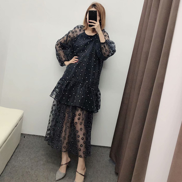 Hosszú női sifon szoknya fekete színben virágmintával