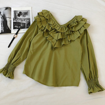 Modern női blúz négy színben V-nyakkal és fürtökkel