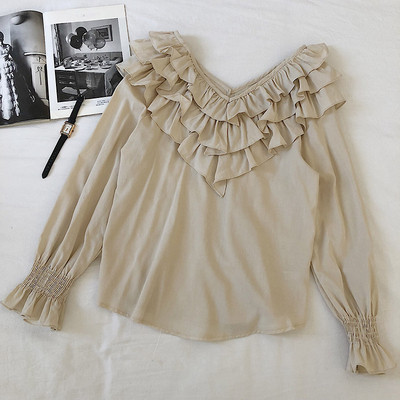 Modern női blúz négy színben V-nyakkal és fürtökkel