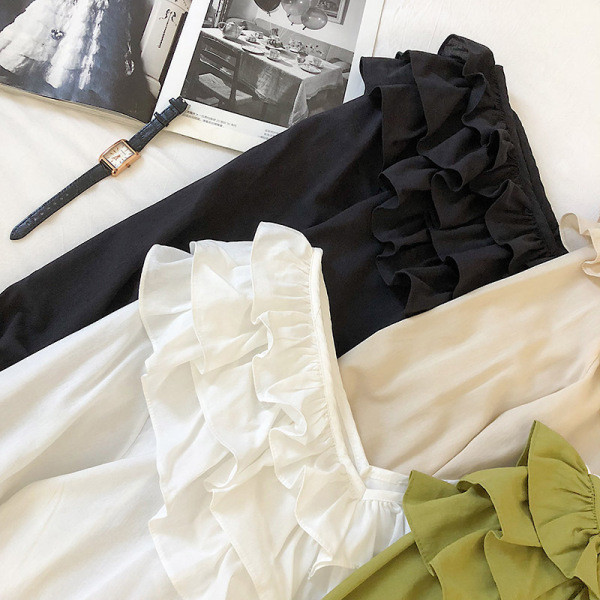 Modern női blúz négy színben V-nyakkal és fürtökkel