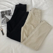 Alkalmi női nadrág fekete és bézs színben, magas derékkal és zsebekkel