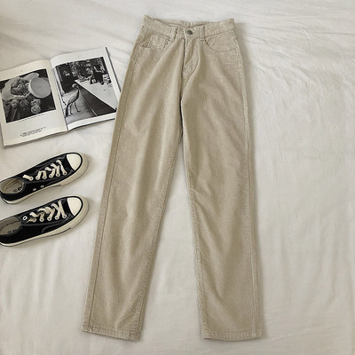 Alkalmi női nadrág fekete és bézs színben, magas derékkal és zsebekkel