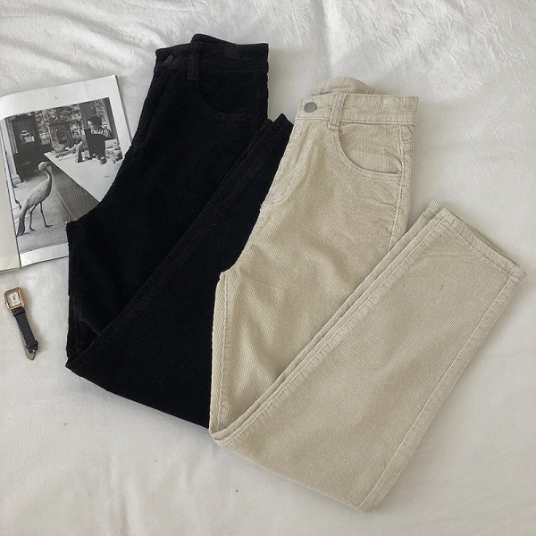 Alkalmi női nadrág fekete és bézs színben, magas derékkal és zsebekkel