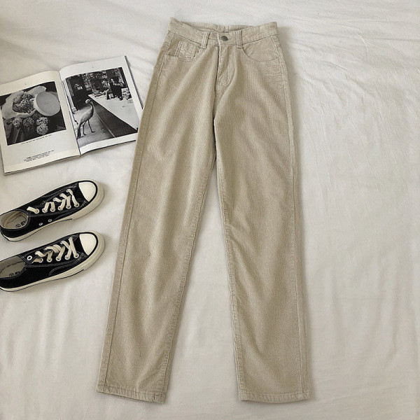 Alkalmi női nadrág fekete és bézs színben, magas derékkal és zsebekkel