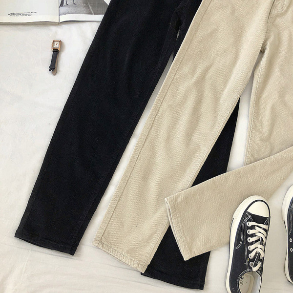 Alkalmi női nadrág fekete és bézs színben, magas derékkal és zsebekkel