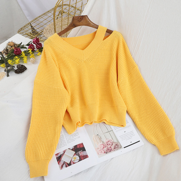 Női pulóver spitz nyakkivágással és kivágásokkal több színben