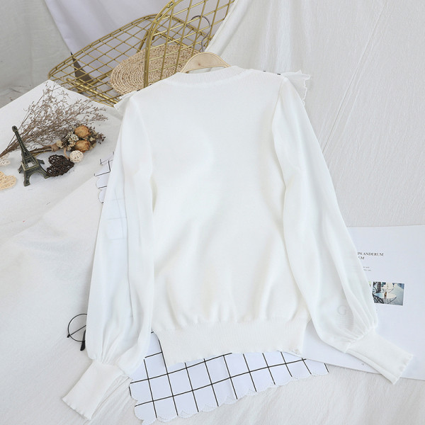 Νέο μοντέλο γυναικείο πουλόβερ  με στρογγυλή λαιμόκοψη σε λευκό και μαύρο χρώμα