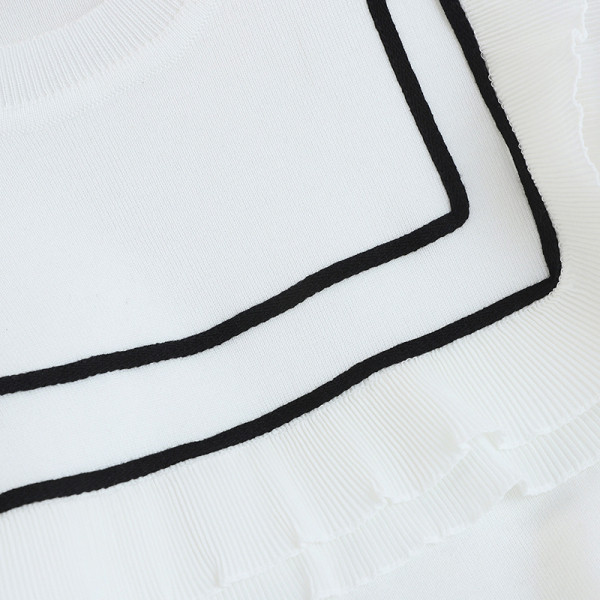 Νέο μοντέλο γυναικείο πουλόβερ  με στρογγυλή λαιμόκοψη σε λευκό και μαύρο χρώμα