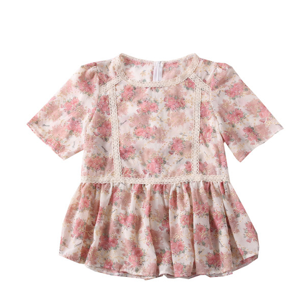 Modern női blúz ovális nyakkivágással és virágmotívumokkal