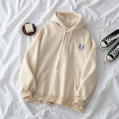 Napi női pulóver négy színben hímzéssel és zsebekkel