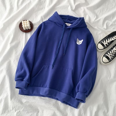 Napi női pulóver négy színben hímzéssel és zsebekkel