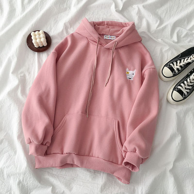 Napi női pulóver négy színben hímzéssel és zsebekkel