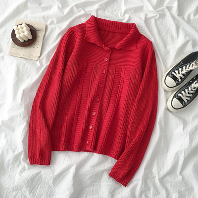 Bézs és piros női mellény, gombokkal és hosszú ujjú