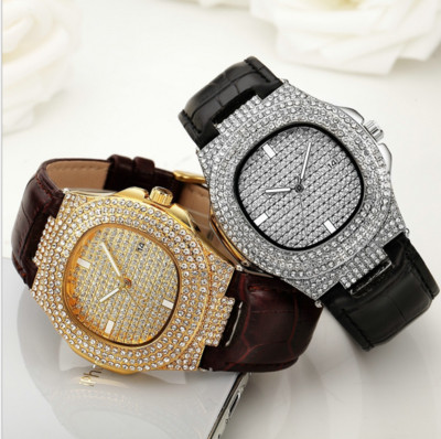 Κομψό γυναικείο ρολόι από οικολογικό δέρμα με διακόσμηση πέτρες σε χρυσό και ασημί χρώμα