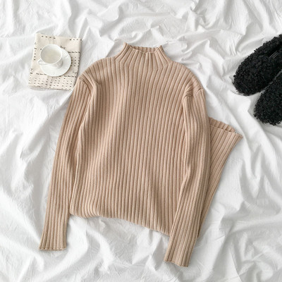 Alkalmi női ruha fekete, fehér és bézs színben pólógallérral és hosszú ujjal