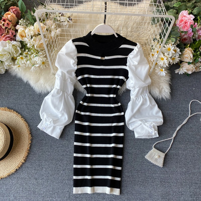 Női téli ruha széles ujjal és félmagas gallérral