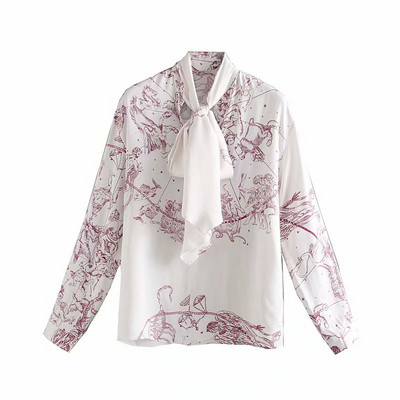 Alkalmi női blúz nyakkivágással szalaggal, fehér színben, színes mintával