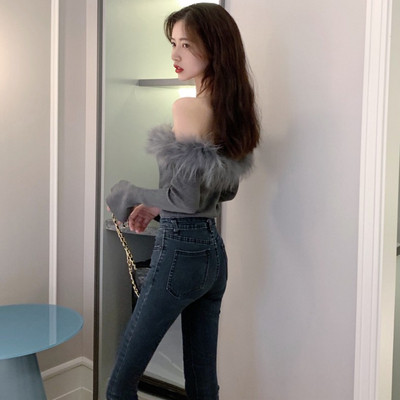 Modern női blúz fekete és szürke színben, pehely és csónakos nyakkivágással