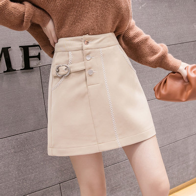 Modern női szoknya bézs és kék színben, gombokkal és magas derékkal