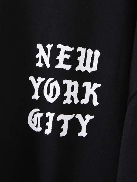 Modern női blúz feliratokkal, csupasz háttal, fekete nyakkendővel