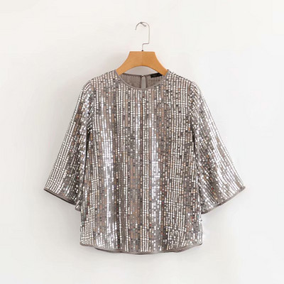 Rövid, széles blúz 3/4 ujjal, fekete és szürke színben, flitterekkel