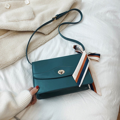 Modern női táska szalaggal és hosszú füllel barna, fekete, kék és bordó színben