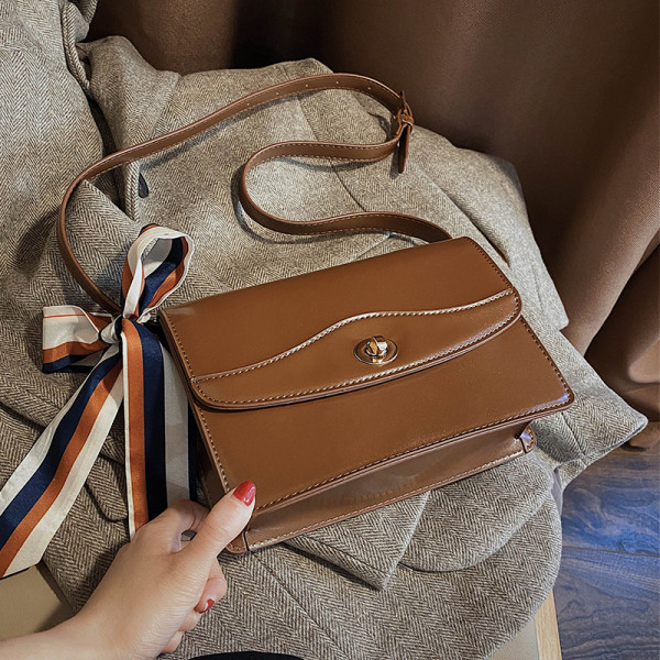 Modern női táska szalaggal és hosszú füllel barna, fekete, kék és bordó színben