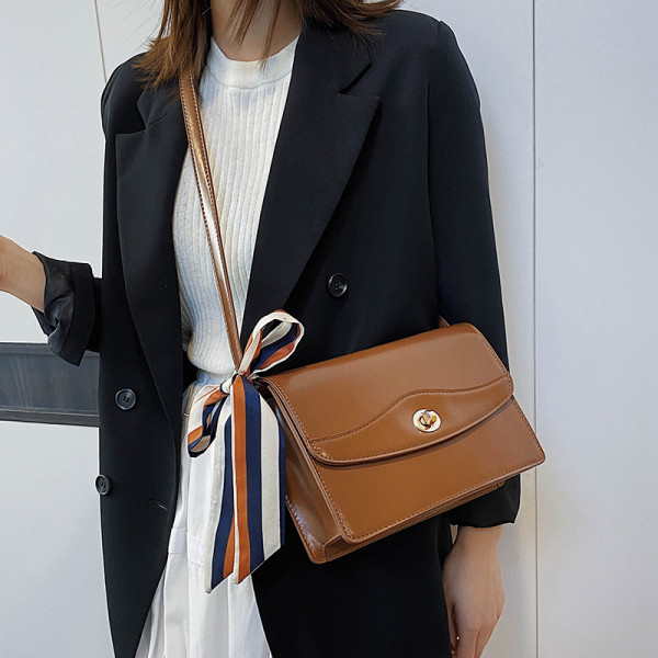 Modern női táska szalaggal és hosszú füllel barna, fekete, kék és bordó színben