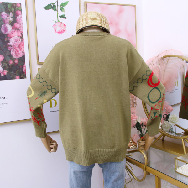 Női pulóver ovális nyakkivágással, bézs és zöld mintával