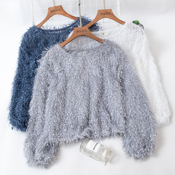 Női pulóver kerek nyakkivágással és rojtokkal kék, fehér, szürke, zöld, rózsaszín és barack színben