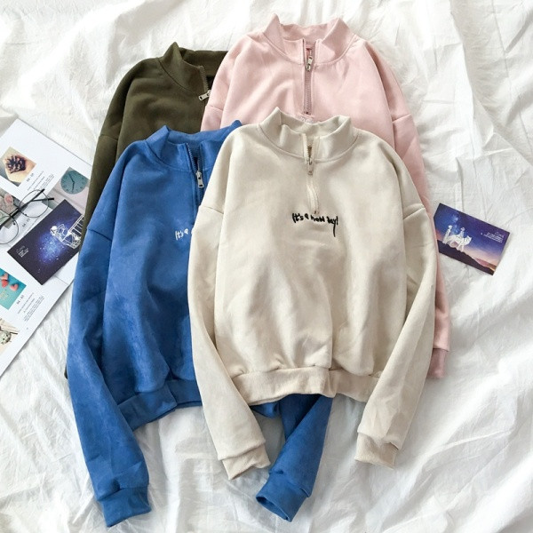 Női alkalmi blúz négy színben, félmagas gallérral és cipzárral