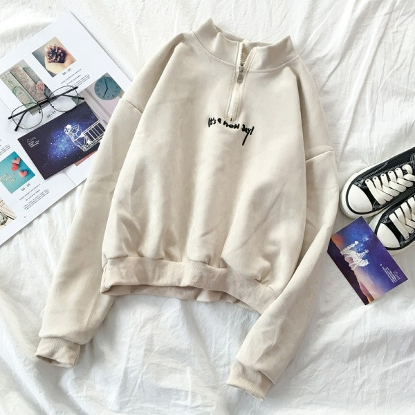 Női alkalmi blúz négy színben, félmagas gallérral és cipzárral