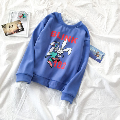 Bluză casual de damă în albastru, alb și verde cu aplicație