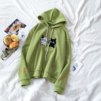 Zöld, sárga és bézs színű női pulóver rátéttel és kapucnival