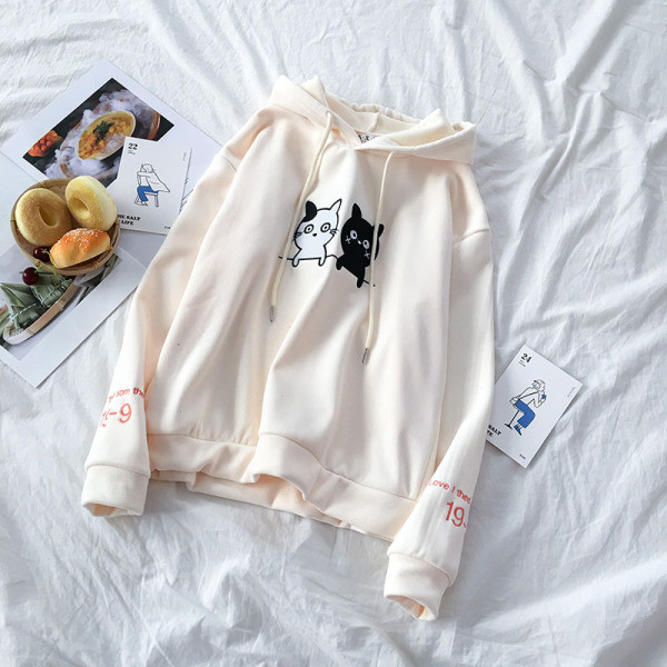 Zöld, sárga és bézs színű női pulóver rátéttel és kapucnival