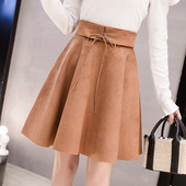 Modern női szoknya szabású modell fekete, szürke és barna színekben, magas derékkal