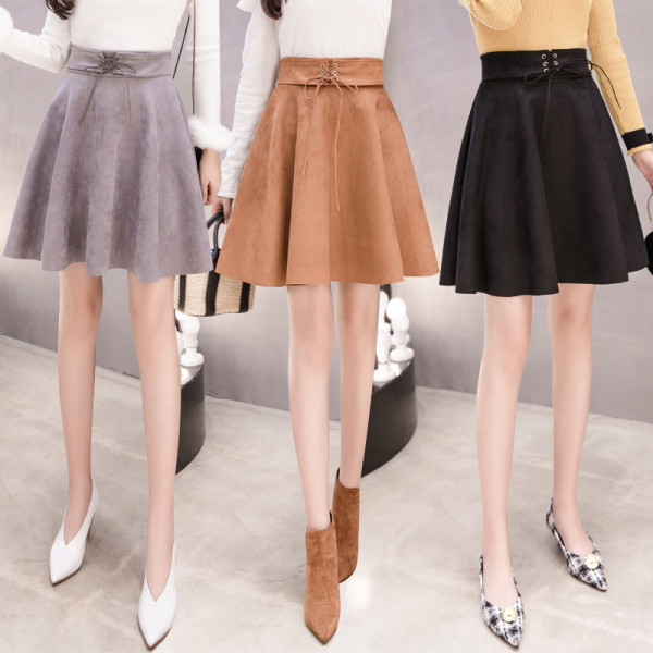 Modern női szoknya szabású modell fekete, szürke és barna színekben, magas derékkal