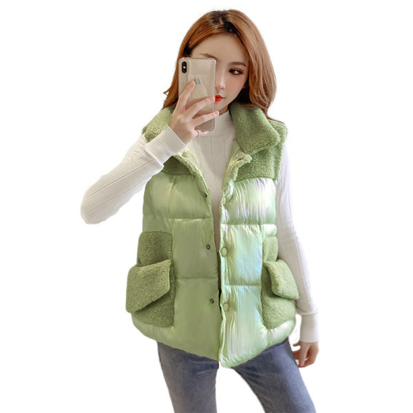 Női mellény zöld, rózsaszín és fehér színben, gombokkal és zsebekkel