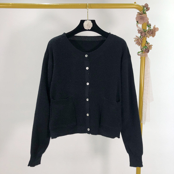 Vesta scurta casual cu buzunare si nasturi in alb si negru