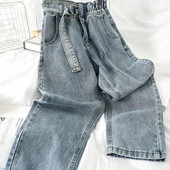 Női farmer széles modell fekete és kék színben, zsebekkel és övvel