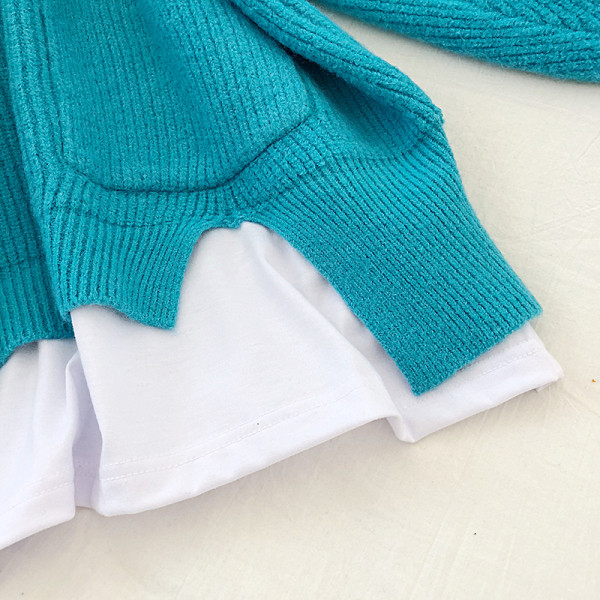 Narancssárga, sárga és kék színű női pulóver zsebbel és kerek nyakkivágással