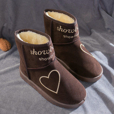 Modern női csizma puha béléssel és színes fekete, szürke és barna hímzéssel