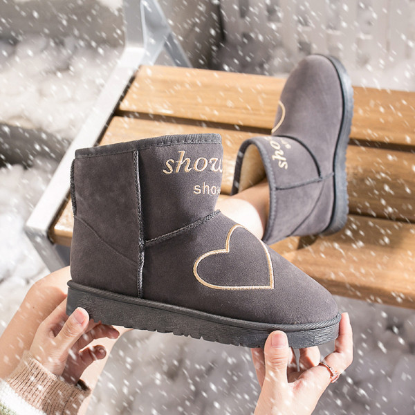 Modern női csizma puha béléssel és színes fekete, szürke és barna hímzéssel