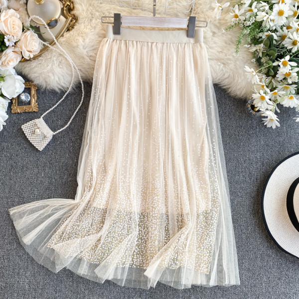 Női pöttyös szoknya magas gallérral és tüllel rózsaszín, bézs, fehér, szürke és fekete színekben